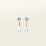 Image of the Pearl Pavé Huggie Clip-On Earrings in Silver feature a mosquito coil clip-on closure and are suitable for all ear types including thick/large, sensitive, small/thin and stretched/healing ears. For a secure but comfortable hold, they can be worn for up to 24 hours and can be adjusted with a gentle squeeze of the padding. Made with Freshwater Pearls and Silver Plated Brass, each pair has natural variations in size and colour.