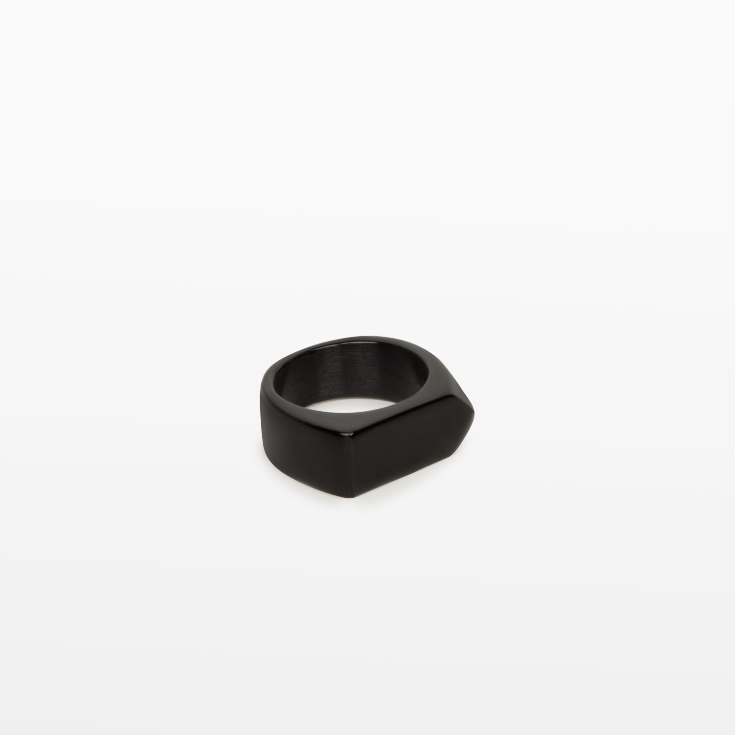 Image of the Pointed Band Ring in Black is made using stainless steel and has a width of 8mm. Its superior construction provides lasting durability and protection from water damage and tarnishing.