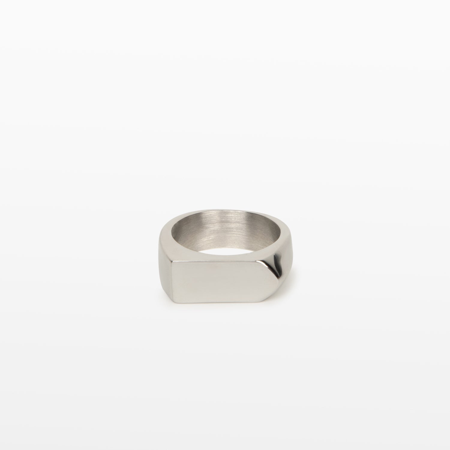 Image of the Pointed Band Ring in Silver is made using stainless steel and has a width of 8mm. Its superior construction provides lasting durability and protection from water damage and tarnishing.