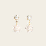 Image of the Rosemary Clip On Earrings. These earrings provide a secure hold for up to 24 hours and are easily adjustable for all ear types. Elevate your style without sacrificing comfort with these must-have accessories.