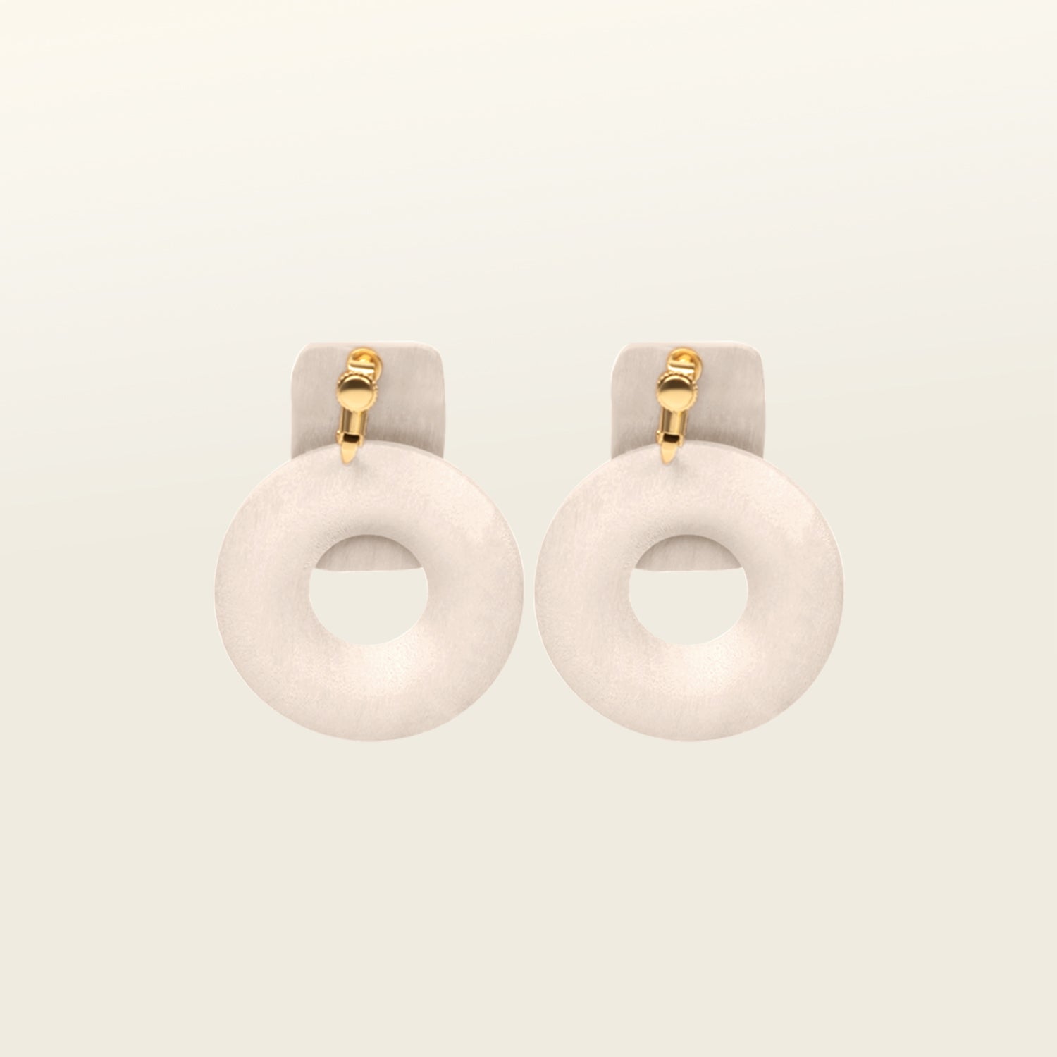 Image of the Sand Dune Clip On Earrings provide a secure hold for 8-12 hours, with the ability to adjust to any ear size. Crafted with copper alloy and wood, one pair is included. The screwback clip-on design is ideal for thick/large, sensitive, small/thin, and stretched/healing ear types.