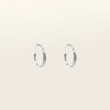 Image of the Silver Cassie Hoop Clip-On Earrings have a resin clip-on closure type and are suitable for all ear types, from thick/large ears to small/thin ears and stretched/healing ears. On average, comfortably wear for 8-12 hours, with a medium secure hold. Unfortunately, these earrings are unable to be adjusted. Offered in Silver Tone metal alloy, the earrings also come in Gold.