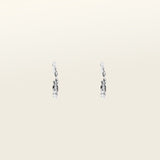 Image of the Silver Wave Hoop Clip-On Earrings are perfect for all ear types. Whether you have thick or large ears, or sensitive, small or thin ears, these earrings offer a medium-secure hold and can be comfortably worn for 8-12 hours. The earrings are made of silver-tone metal alloy and offer no ability to adjust - each purchase is for one pair. You can also find these earrings in a gold version.