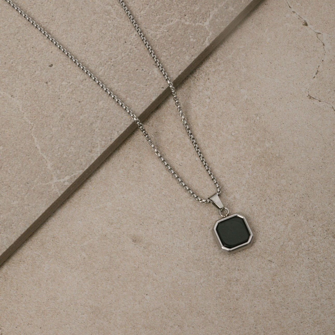 Image of the Square Signet Pendant Chain is crafted from durable stainless steel, providing reliable wear and tear resistance. It's also non-tarnish, water resistant, and free of lead, nickel, and cadmium.