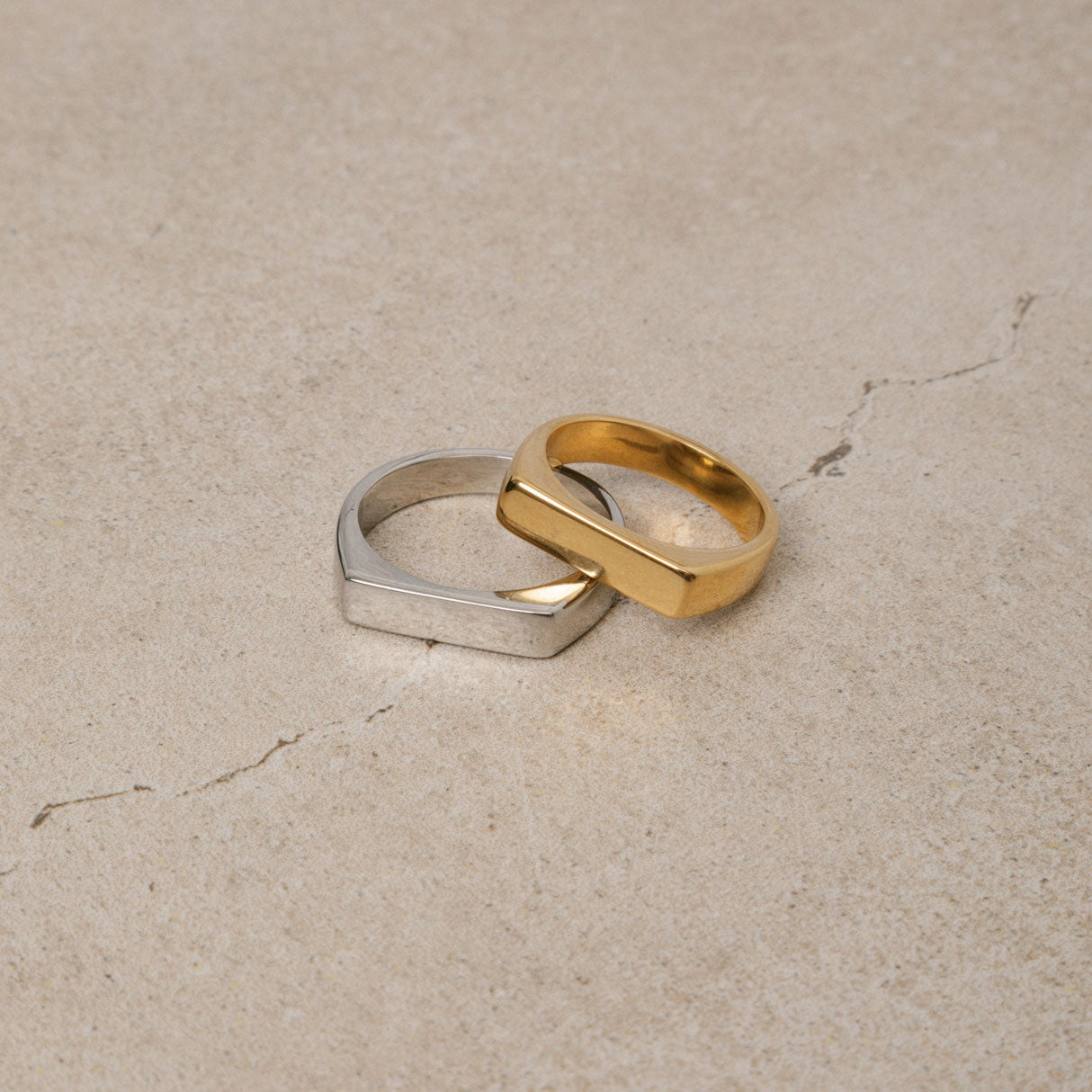 Image of the Straight Band Ring in Silver crafted from Stainless Steel, measuring 4mm in width, and featuring non-tarnish and water-resistant properties.