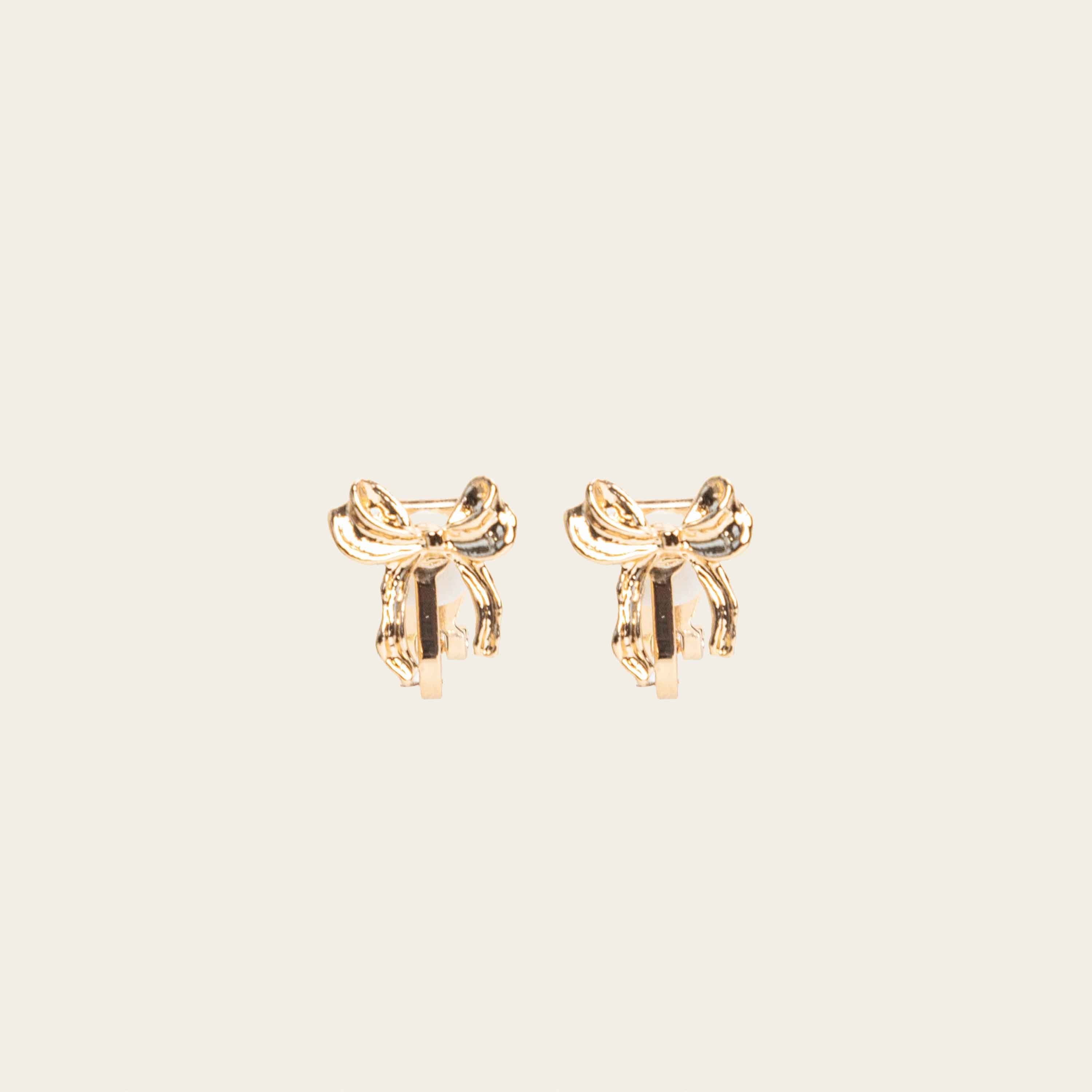 Image of the Taylor Clip On Earrings. Adjustable for sensitive or stretched ears, these earrings offer a 24-hour hold for effortless style at any occasion. Enjoy the perfect blend of elegance and ease with Taylor.