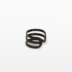Image of the Triple Band Ear Cuff features a secure medium hold, adjustable fit, and non-tarnish, water-resistant stainless steel and titanium construction. Its 9mm diameter and 6mm width makes it ideal for all ear types, including thick/large, sensitive, small/thin, and stretched/healing ears. Average comfortable wear duration is up to 24 hours for one piece. Intended to be worn on the helix of the ear.