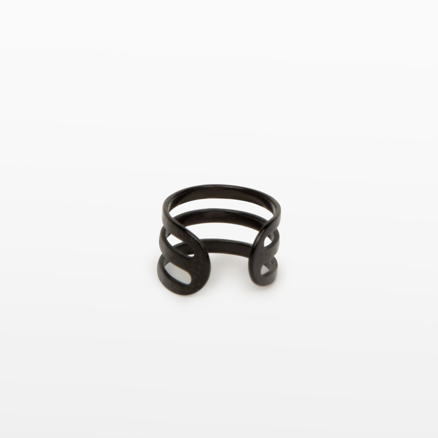 Image of the Triple Band Ear Cuff features a secure medium hold, adjustable fit, and non-tarnish, water-resistant stainless steel and titanium construction. Its 9mm diameter and 6mm width makes it ideal for all ear types, including thick/large, sensitive, small/thin, and stretched/healing ears. Average comfortable wear duration is up to 24 hours for one piece. Intended to be worn on the helix of the ear.