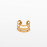 Image of the Triple Band Ear Cuff features a secure medium hold, adjustable fit, and non-tarnish, water-resistant stainless steel and titanium construction. Its 9mm diameter and 6mm width makes it ideal for all ear types, including thick/large, sensitive, small/thin, and stretched/healing ears. Average comfortable wear duration is up to 24 hours for one piece. Intended to be worn on the helix of the ear.