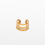 Image of the Triple Band Ear Cuff features a secure medium hold, adjustable fit, and non-tarnish, water-resistant stainless steel and titanium construction. Its 9mm diameter and 6mm width makes it ideal for all ear types, including thick/large, sensitive, small/thin, and stretched/healing ears. Average comfortable wear duration is up to 24 hours for one piece. Intended to be worn on the helix of the ear.