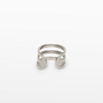 Image of the Triple Band Ear Cuff features a secure medium hold, adjustable fit, and non-tarnish, water-resistant stainless steel and titanium construction. Its 9mm diameter and 6mm width makes it ideal for all ear types, including thick/large, sensitive, small/thin, and stretched/healing ears. Average comfortable wear duration is up to 24 hours for one piece. Intended to be worn on the helix of the ear.