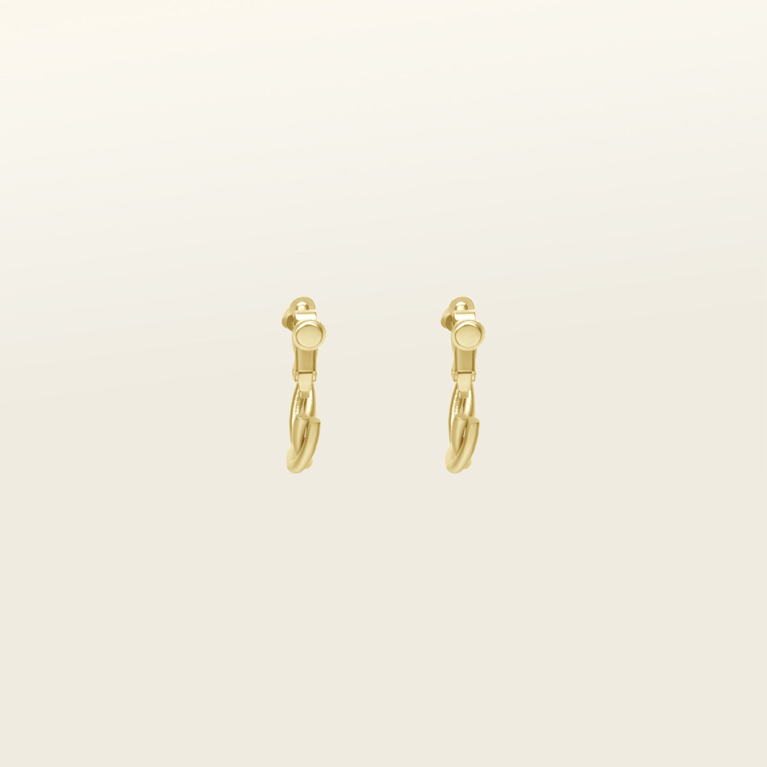 Image of the Twist Hoop Earrings feature a secure and comfortable screwback clip-on closure ideal for all ear types. Wear these earrings for up to 8-12 hours per day with a secure hold and the ability to be manually adjusted to the individual's size. Crafted from gold tone plated copper alloy, these earrings come is a single pair.