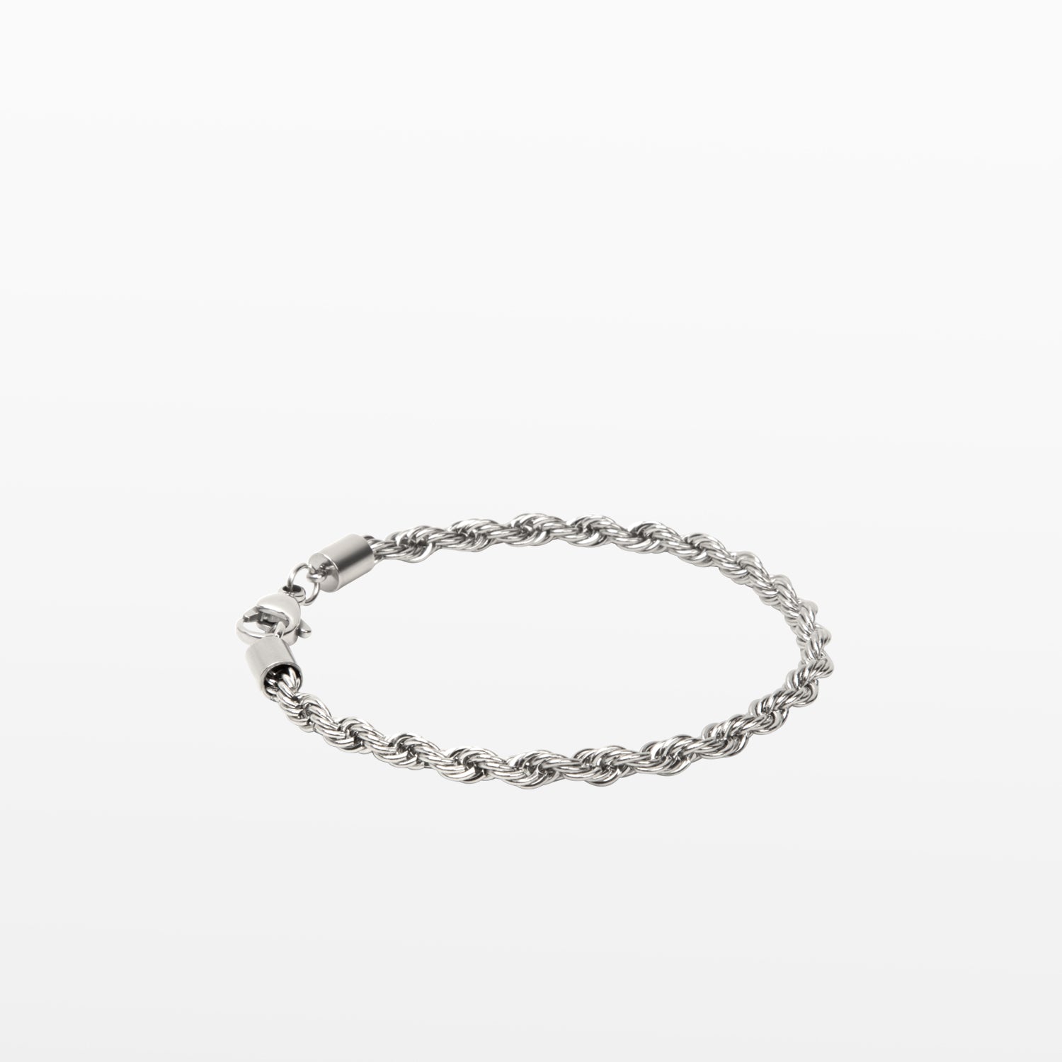 Image of the Twist Rope Chain Bracelet in Silver is crafted from non-tarnish and water-resistant stainless steel, with dimensions of 18 cm in length and 4 mm in width.