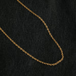 Image of the Twisted Rope Chain in Gold is crafted from thick 18K Gold Plated material. Dimensions are measured at 45cm, 50cm, or 55cm in length and 3mm in width. As an additional assurance, it is designed to be Allergy-free, Non-Tarnishable, and Water-resistant.