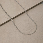 Image of the Twisted Rope Chain in Silver is crafted from durable stainless steel. It measures 45cm, 50cm, or 55cm in length and 3mm in width. Additionally, it is non-tarnishing, water-resistant, and safe for those with allergies.