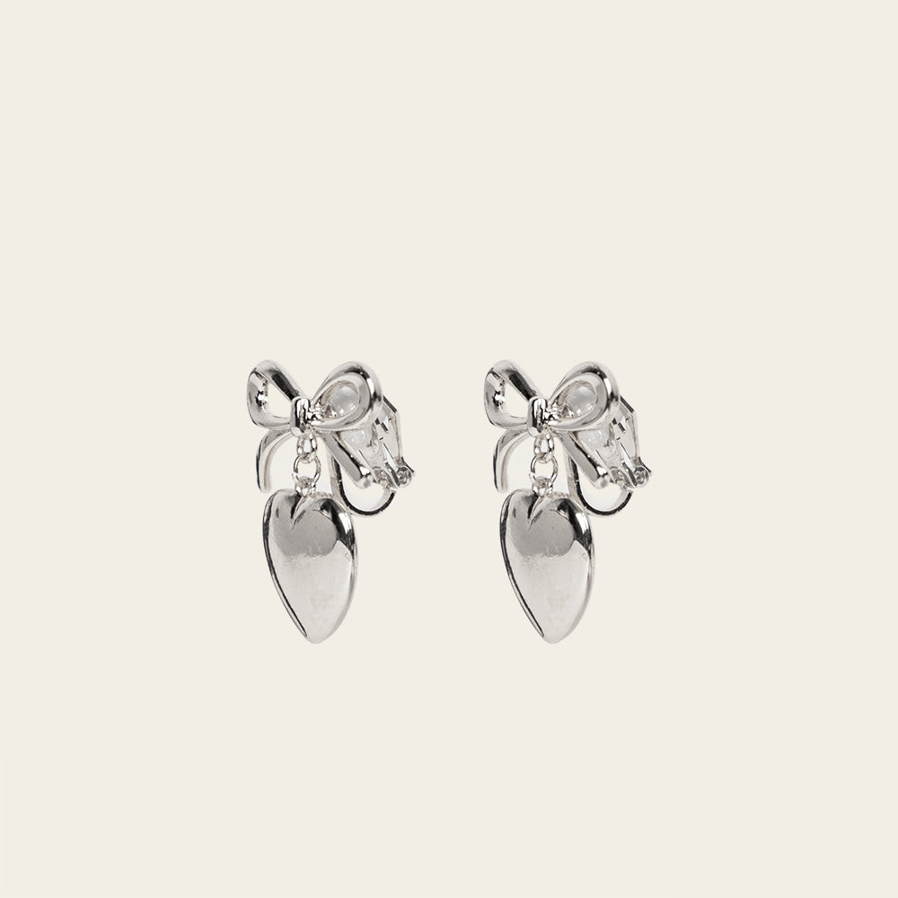 Image of the Venus Clip On Earrings. Specially designed for sensitive or stretched ears, these earrings ensure a secure 24-hour hold and customizable fit for unmatched comfort. Elevate your style with effortless elegance.