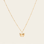 Image of the Wendy Necklace - the perfect combination of style and durability. This versatile accessory, made from non-tarnish 18K gold-plated stainless steel, is water-resistant and suitable for any occasion. With its adjustable design, it's the only necklace you'll ever need. 