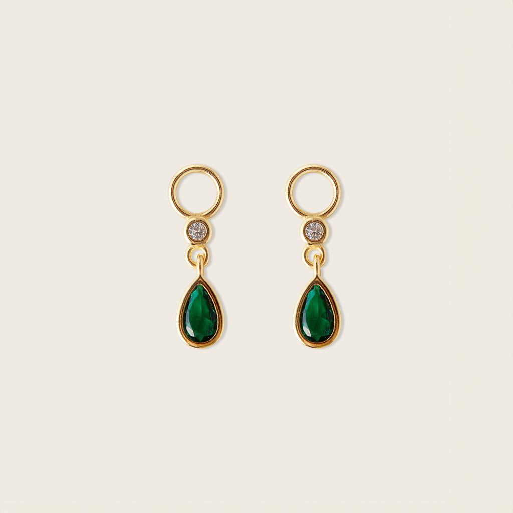 Image of the Emerald Drop Hoop Charms are made with high-quality materials, including 18K gold plating over 925 Sterling Silver. These charms are both non-tarnish and water resistant. The perfect combination of style and durability.