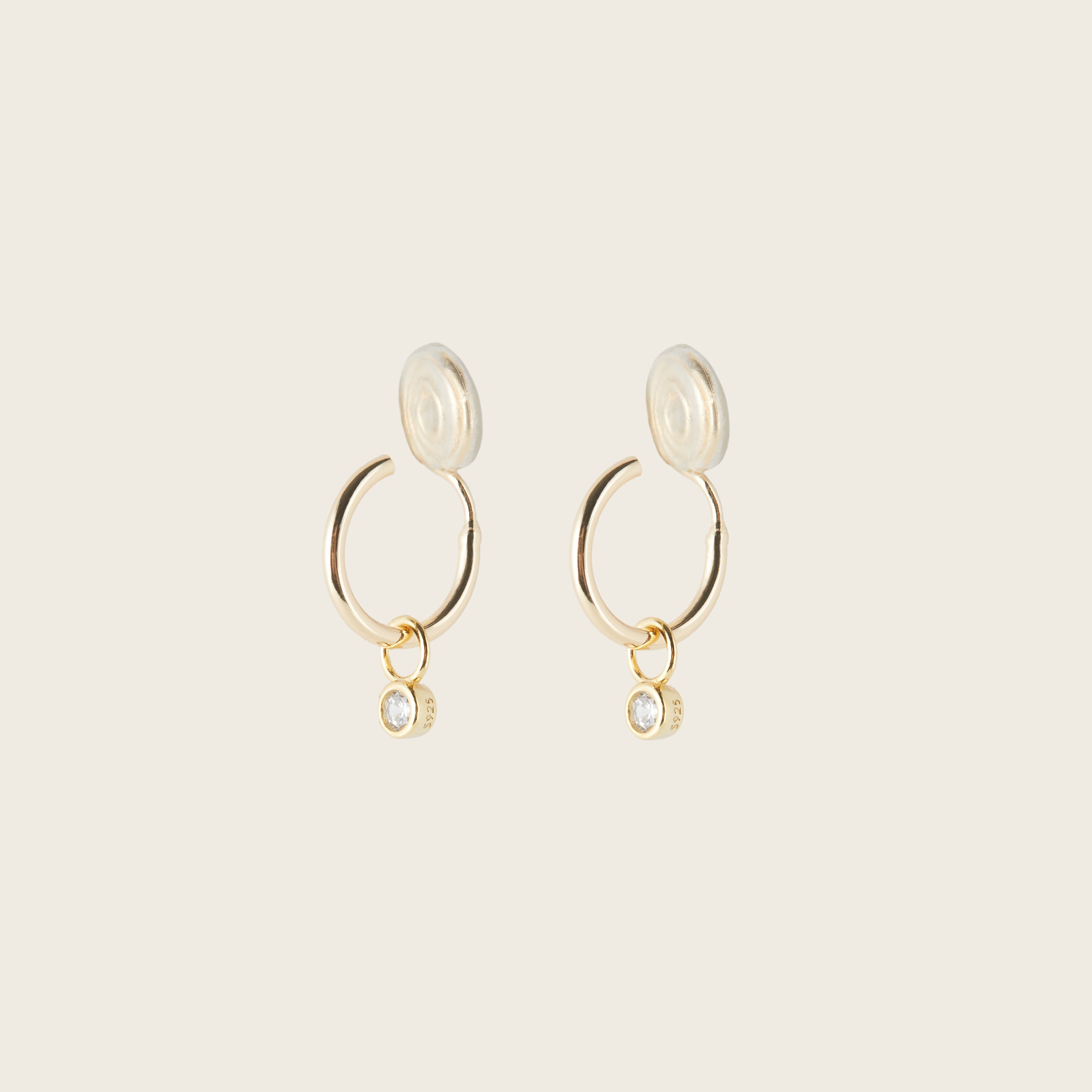 Image of the Mini Gemstone Hoop Charms are made with high-quality materials, including 18K gold plating over 925 Sterling Silver. These charms are both non-tarnish and water resistant. The perfect combination of style and durability.