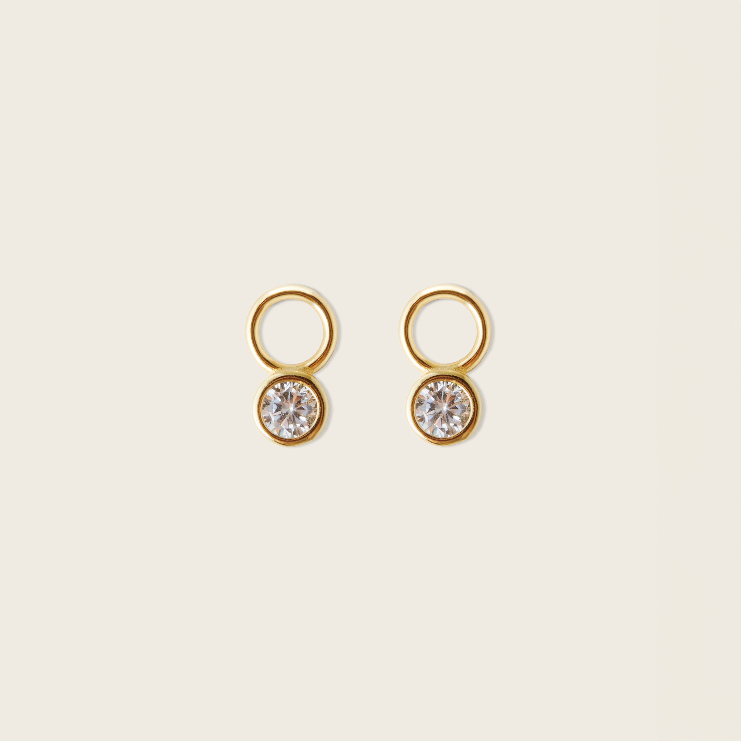 Image of the Mini Gemstone Hoop Charms are made with high-quality materials, including 18K gold plating over 925 Sterling Silver. These charms are both non-tarnish and water resistant. The perfect combination of style and durability.