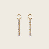 Image of the Pavé Bar Hoop Charms are made with high-quality materials, including 18K gold plating over 925 Sterling Silver. These charms are both non-tarnish and water resistant. The perfect combination of style and durability.