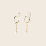 Image of the Pearl Dangle Hoop Charms are made with high-quality materials, including 18K gold plating over 925 Sterling Silver. These charms are both non-tarnish and water resistant. The perfect combination of style and durability.