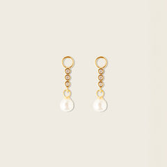 Image of the Pearl Dangle Hoop Charms are made with high-quality materials, including 18K gold plating over 925 Sterling Silver. These charms are both non-tarnish and water resistant. The perfect combination of style and durability.