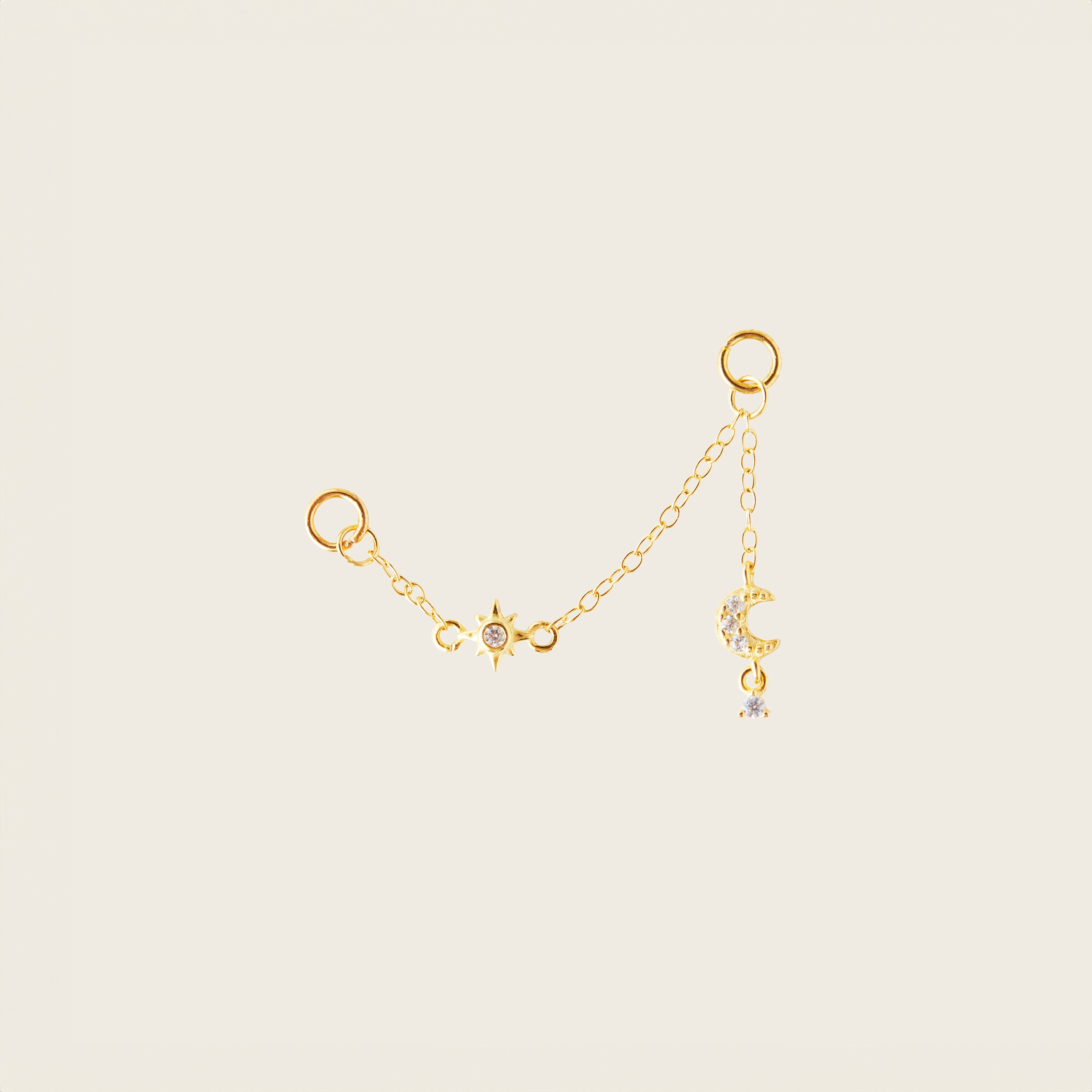 Image of the Single Celestial Hoop Chain are made with high-quality materials, including 18K gold plating over 925 Sterling Silver. These charms are both non-tarnish and water resistant. The perfect combination of style and durability.