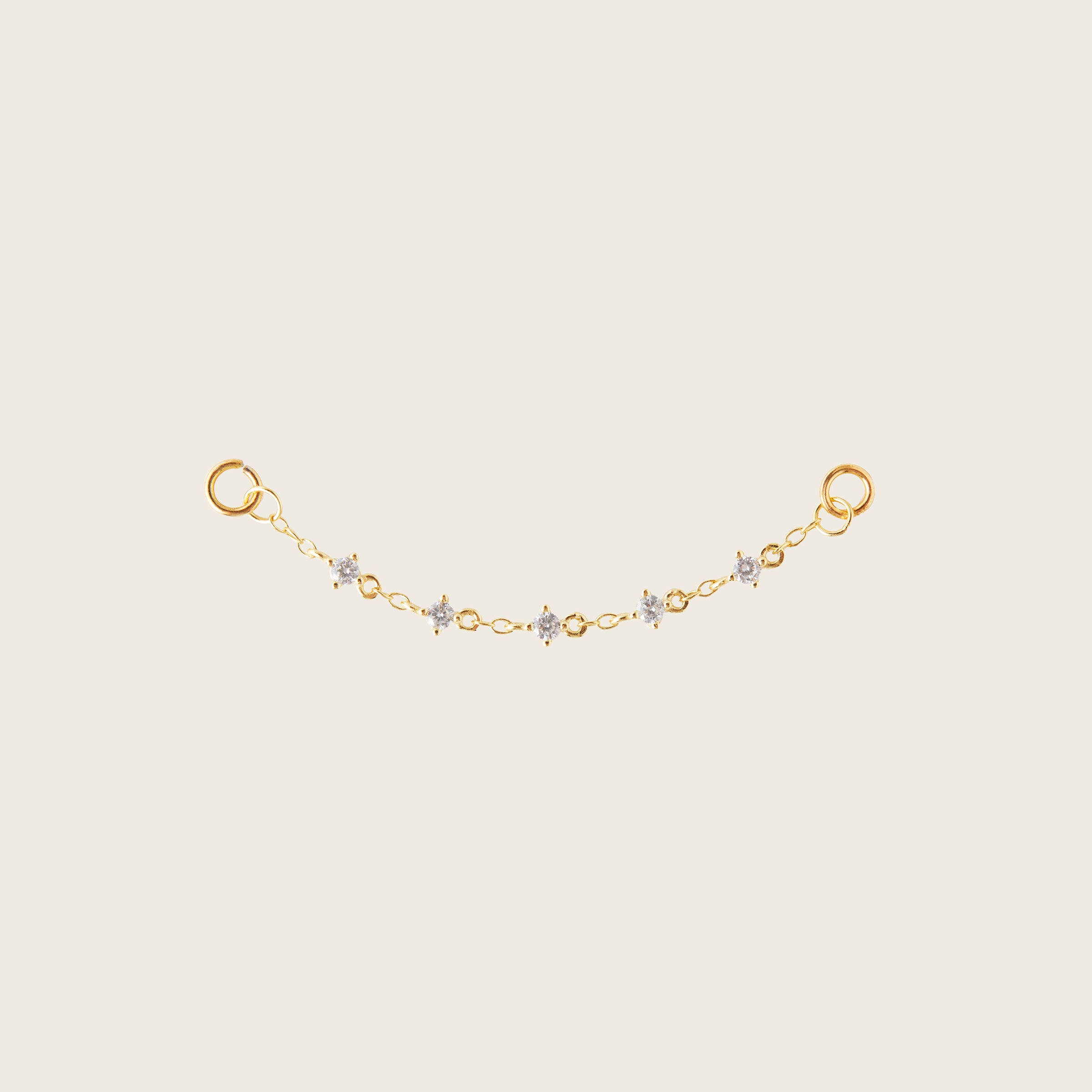 Image of the Single Cluster Hoop Chain are made with high-quality materials, including 18K gold plating over 925 Sterling Silver. These charms are both non-tarnish and water resistant. The perfect combination of style and durability.