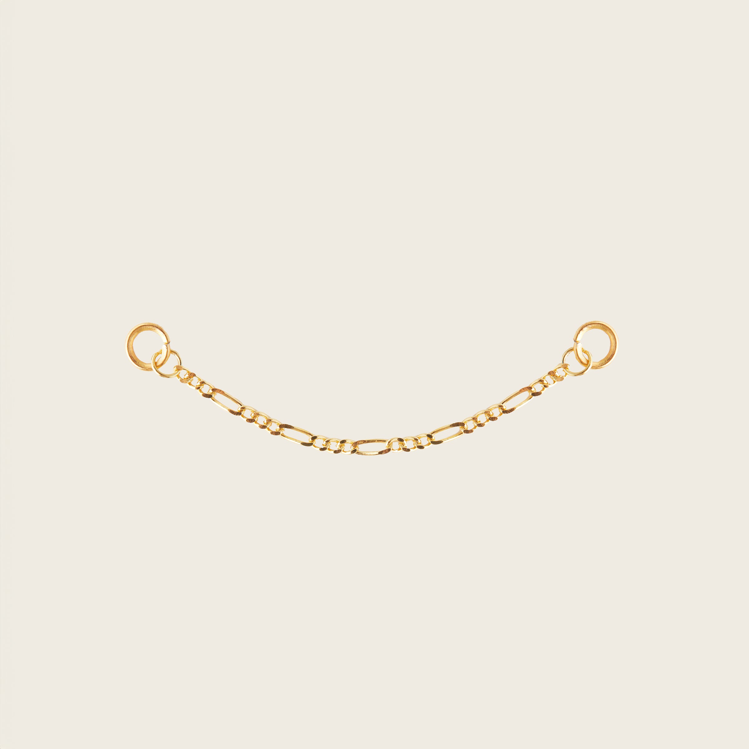 Image of the Single Figaro Hoop Chain are made with high-quality materials, including 18K gold plating over 925 Sterling Silver. These charms are both non-tarnish and water resistant. The perfect combination of style and durability.