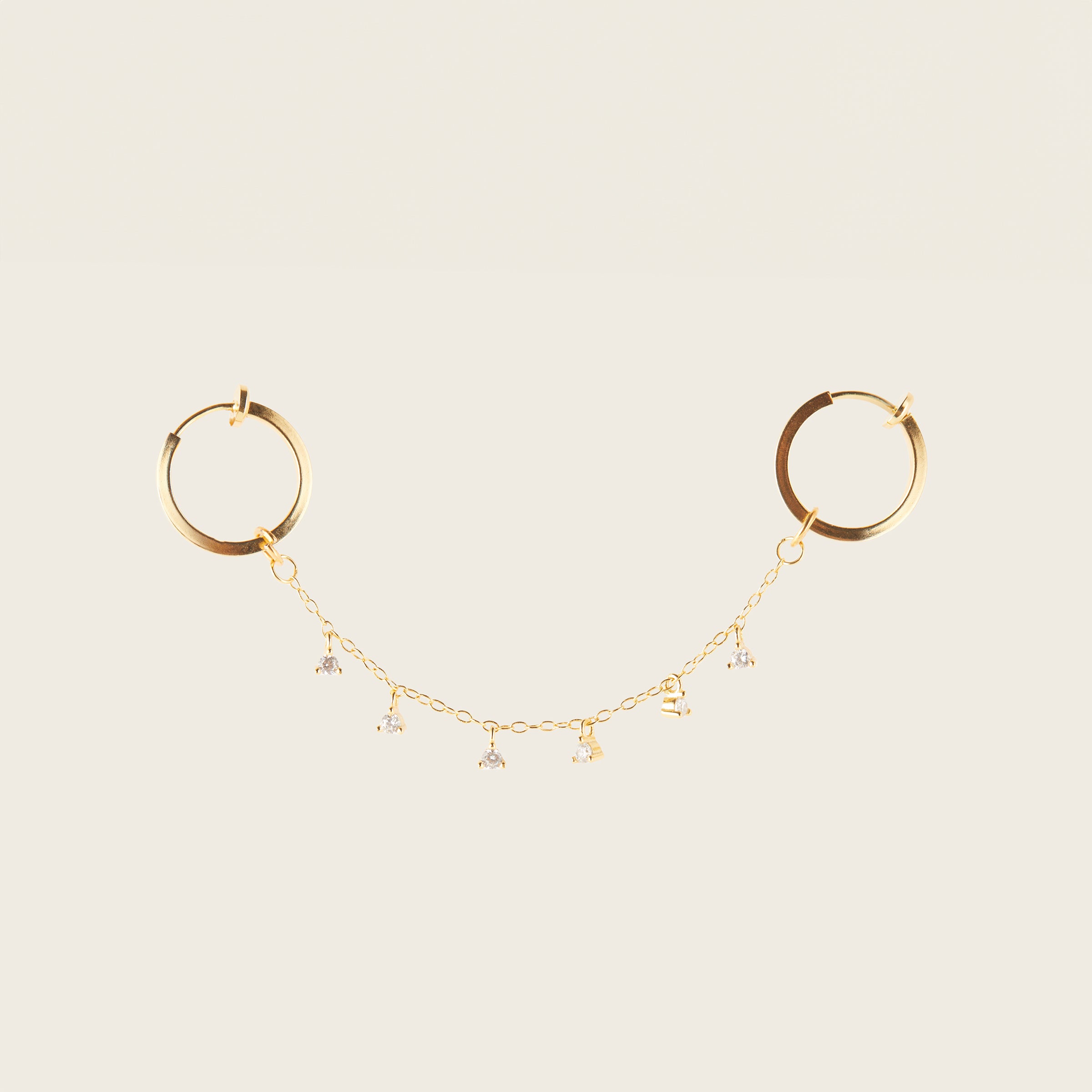 Image of the Single Triangle Charm Hoop Chain are made with high-quality materials, including 18K gold plating over 925 Sterling Silver. These charms are both non-tarnish and water resistant. The perfect combination of style and durability.