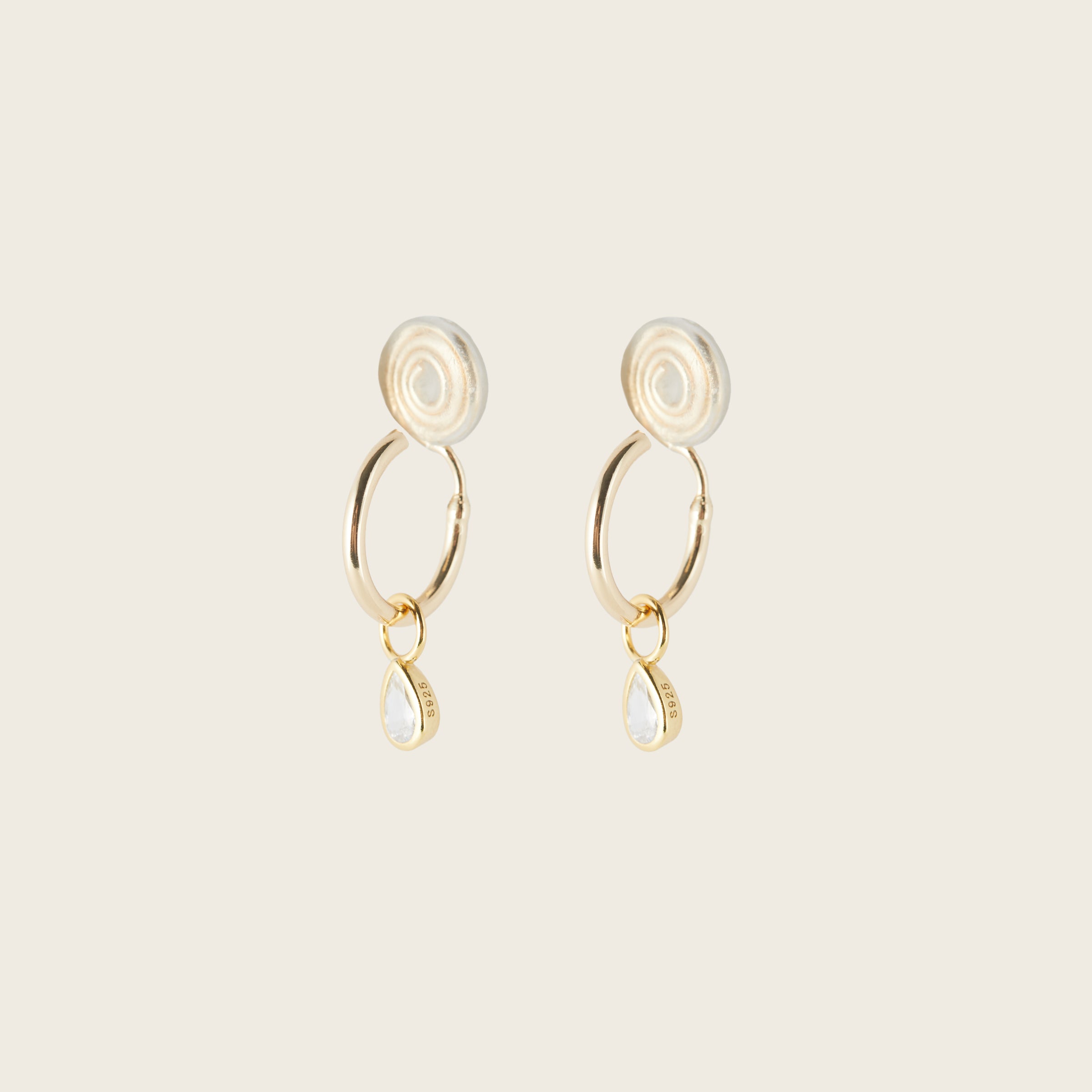 Image of the Teardrop Hoop Charms are made with high-quality materials, including 18K gold plating over 925 Sterling Silver. These charms are both non-tarnish and water resistant. The perfect combination of style and durability.