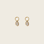 Image of the Teardrop Hoop Charms are made with high-quality materials, including 18K gold plating over 925 Sterling Silver. These charms are both non-tarnish and water resistant. The perfect combination of style and durability.