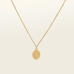 Product catalogue photo of a gold plated necklace with celestial markings. This necklace is made of 18k gold plated vermeil on stainless steel and is tarnish free and waterproof.