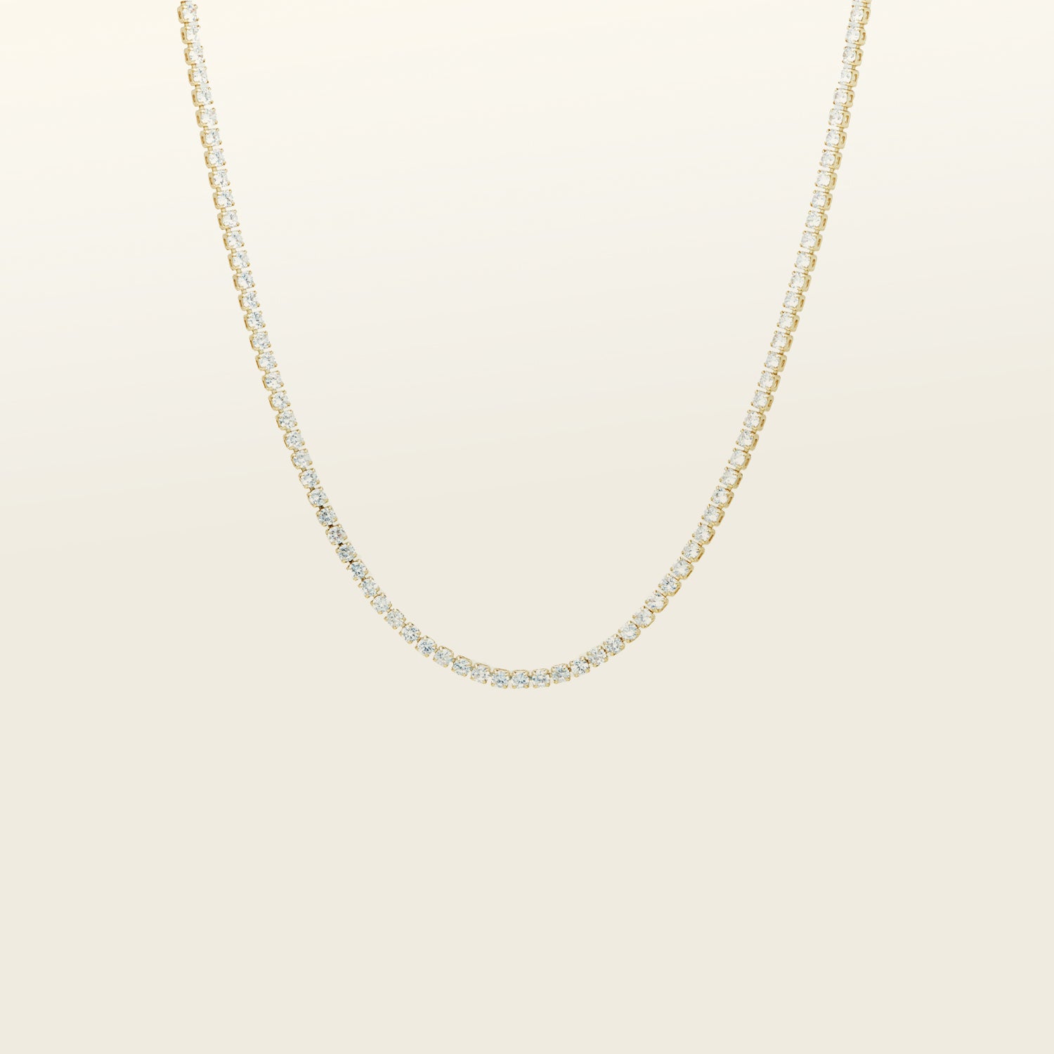 Image of the Classic Tennis Necklace is expertly crafted from prime 14K Gold Plated material, then set with Cubic Zirconia gems for a breathtaking shimmer. This captivating piece is built to withstand the test of time, thanks to its tarnish-resistant, waterproof, nickel-free construction and hypoallergenic materials. Complement your look by pairing this necklace with its sister Classic Tennis Bracelet.