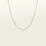Image of the Classic Tennis Necklace is expertly crafted from prime 14K Gold Plated material, then set with Cubic Zirconia gems for a breathtaking shimmer. This captivating piece is built to withstand the test of time, thanks to its tarnish-resistant, waterproof, nickel-free construction and hypoallergenic materials. Complement your look by pairing this necklace with its sister Classic Tennis Bracelet.