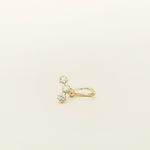 Image of the Constellation Ear Cuff in gold, a captivating and modern accessory that elevates your style. Crafted from copper alloy and available in gold or silver plating, this ear cuff boasts a celestial Constellation shape adorned with three sparkling cubic zirconia stars. Suitable for all genders, this stylish design is guaranteed to add an elegant and celestial touch to any outfit, making it a standout piece in your collection.