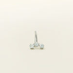 Image of the Constellation Ear Cuff in silver, a captivating and modern accessory that elevates your style. Crafted from copper alloy and available in gold or silver plating, this ear cuff boasts a celestial Constellation shape adorned with three sparkling cubic zirconia stars. Suitable for all genders, this stylish design is guaranteed to add an elegant and celestial touch to any outfit, making it a standout piece in your collection.