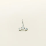 Image of the Constellation Ear Cuff in silver, a captivating and modern accessory that elevates your style. Crafted from copper alloy and available in gold or silver plating, this ear cuff boasts a celestial Constellation shape adorned with three sparkling cubic zirconia stars. Suitable for all genders, this stylish design is guaranteed to add an elegant and celestial touch to any outfit, making it a standout piece in your collection.