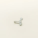 Image of the Constellation Ear Cuff in silver, a captivating and modern accessory that elevates your style. Crafted from copper alloy and available in gold or silver plating, this ear cuff boasts a celestial Constellation shape adorned with three sparkling cubic zirconia stars. Suitable for all genders, this stylish design is guaranteed to add an elegant and celestial touch to any outfit, making it a standout piece in your collection.