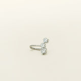 Image of the Constellation Ear Cuff in silver, a captivating and modern accessory that elevates your style. Crafted from copper alloy and available in gold or silver plating, this ear cuff boasts a celestial Constellation shape adorned with three sparkling cubic zirconia stars. Suitable for all genders, this stylish design is guaranteed to add an elegant and celestial touch to any outfit, making it a standout piece in your collection.