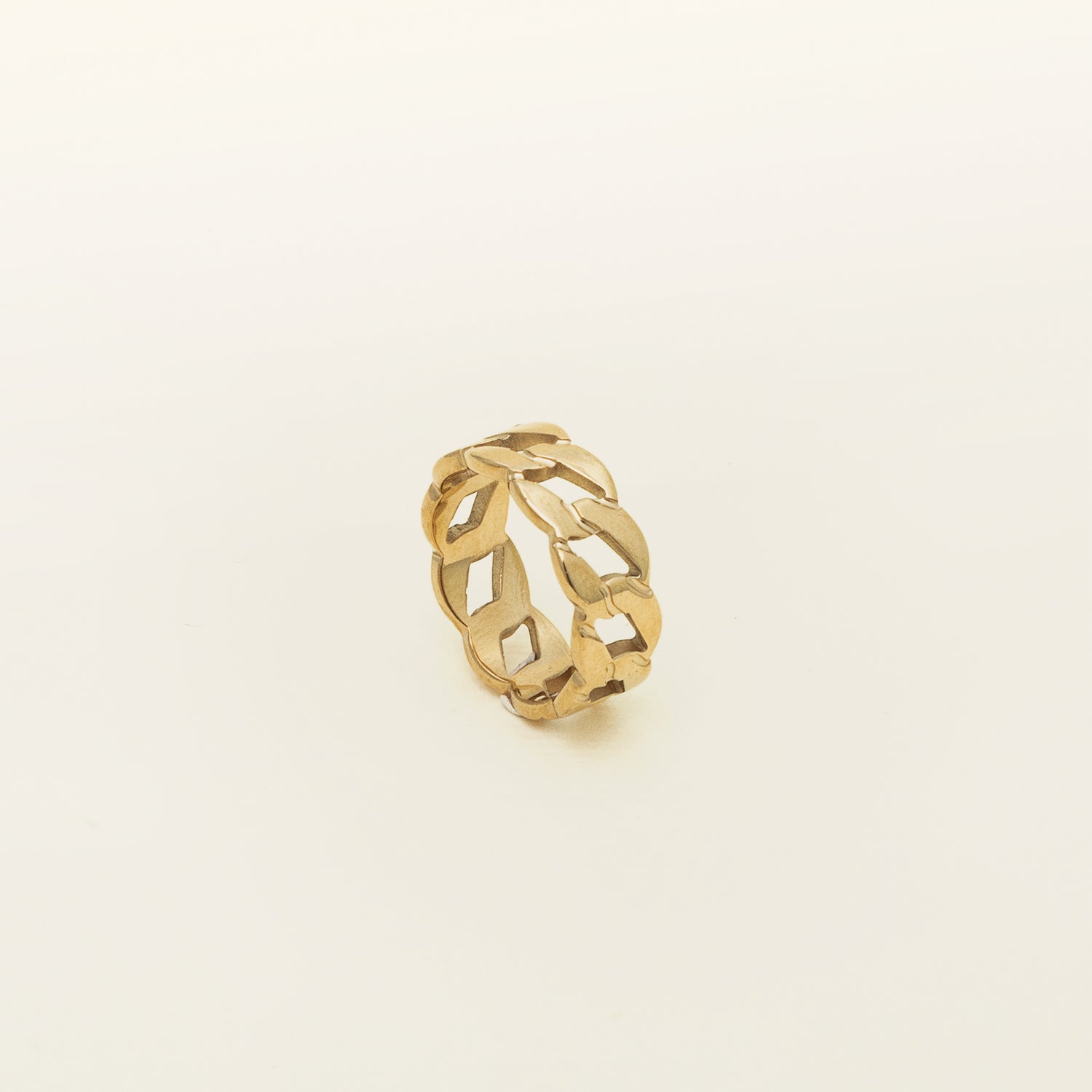 Image of the Cuban Link Chain Ring, crafted with 18K gold plating on stainless steel, delivering dependable protection from discoloration and water damage. Its unique design exudes a fashionable air, certain to make an impression.
