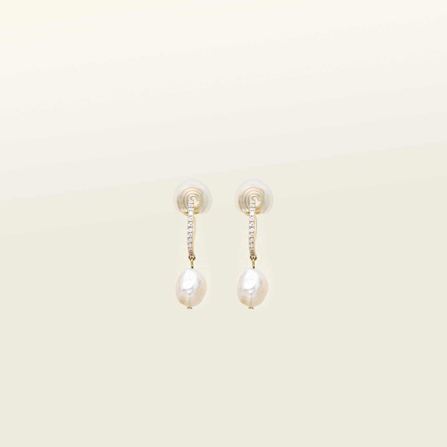 Image of the Pearl Pavé Huggie Clip-On Earrings in Gold offer a secure yet adjustable hold with an average comfortable wear duration of 24 hours. Featuring high-quality Freshwater Pearls and 18K Gold Plated Stainless Steel, these earrings are ideal for all ear types and sizes. Each piece may vary slightly in size and color.