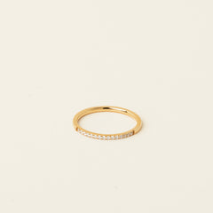 Image of the Pavé Band Ring cannot be adjusted. Crafted with 18K Gold Plated Stainless Steel and featuring Cubic Zirconia, it is both non-tarnishing and waterproof.