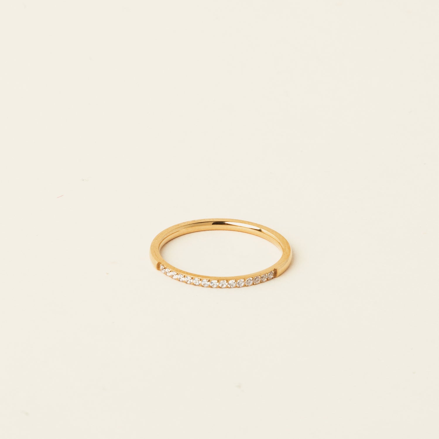 Image of the Pavé Band Ring cannot be adjusted. Crafted with 18K Gold Plated Stainless Steel and featuring Cubic Zirconia, it is both non-tarnishing and waterproof.