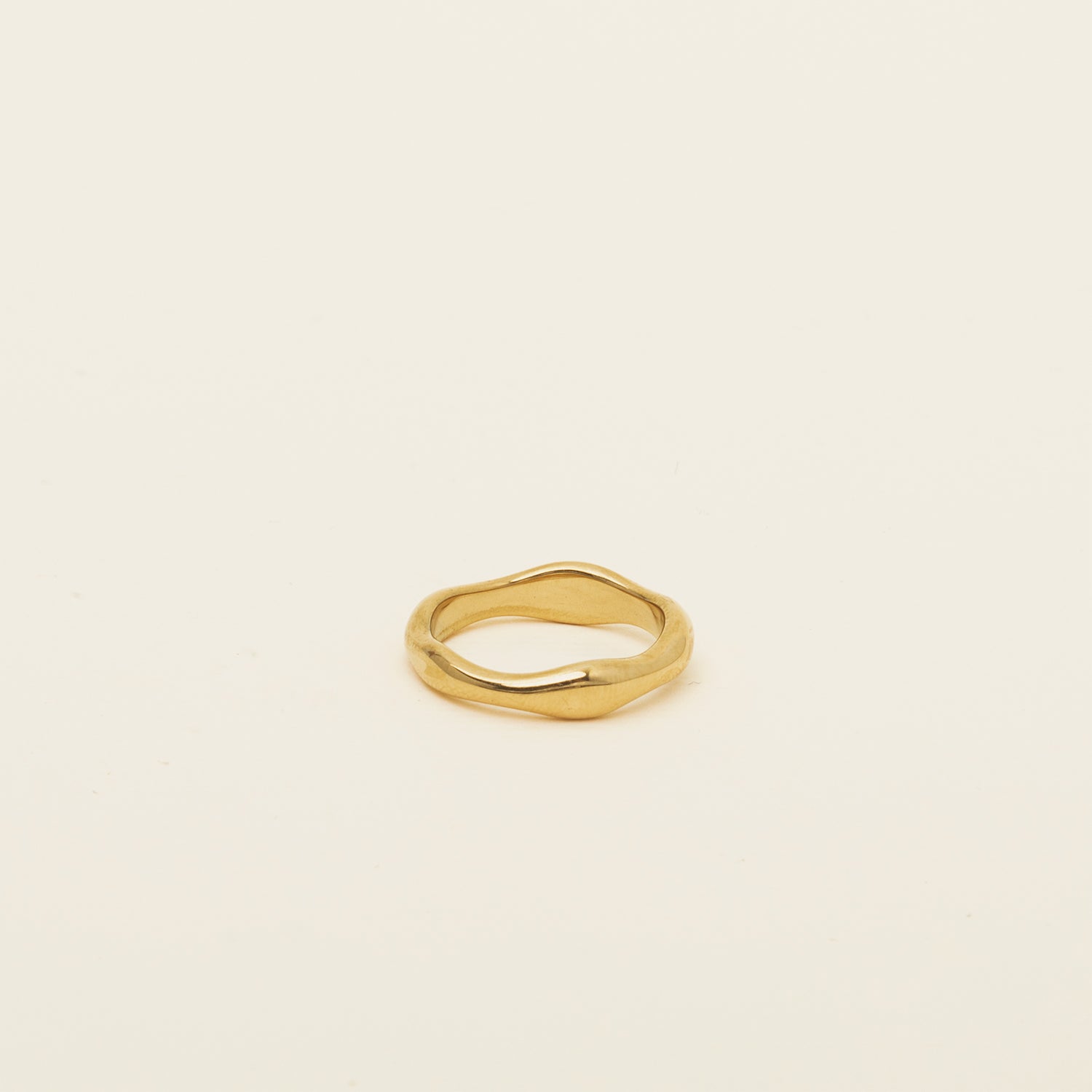 Image of the Organic Wave Ring offers no ability to adjust and is a single item comprised of 18K Gold Plated Stainless Steel, making it non-tarnish and water resistant.