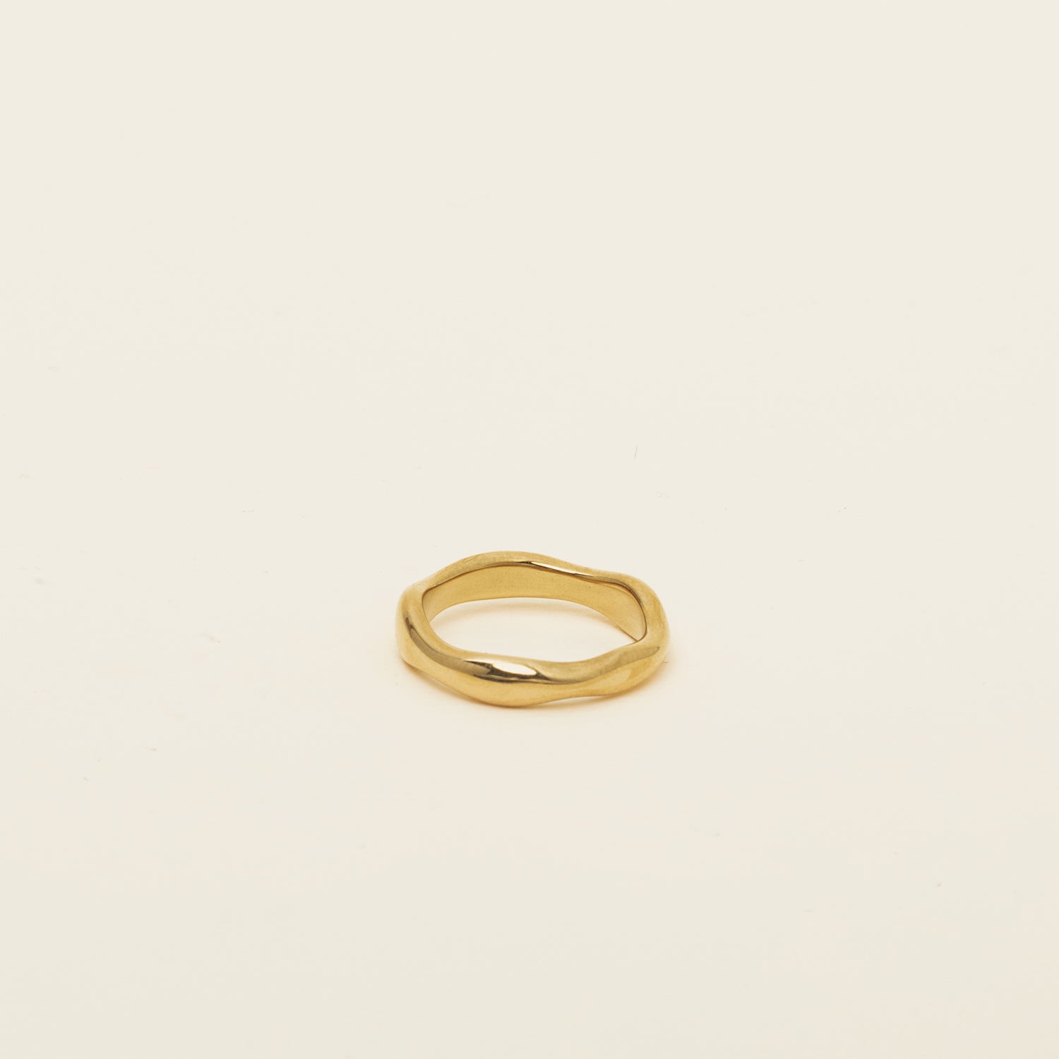 Image of the Organic Wave Ring offers no ability to adjust and is a single item comprised of 18K Gold Plated Stainless Steel, making it non-tarnish and water resistant.